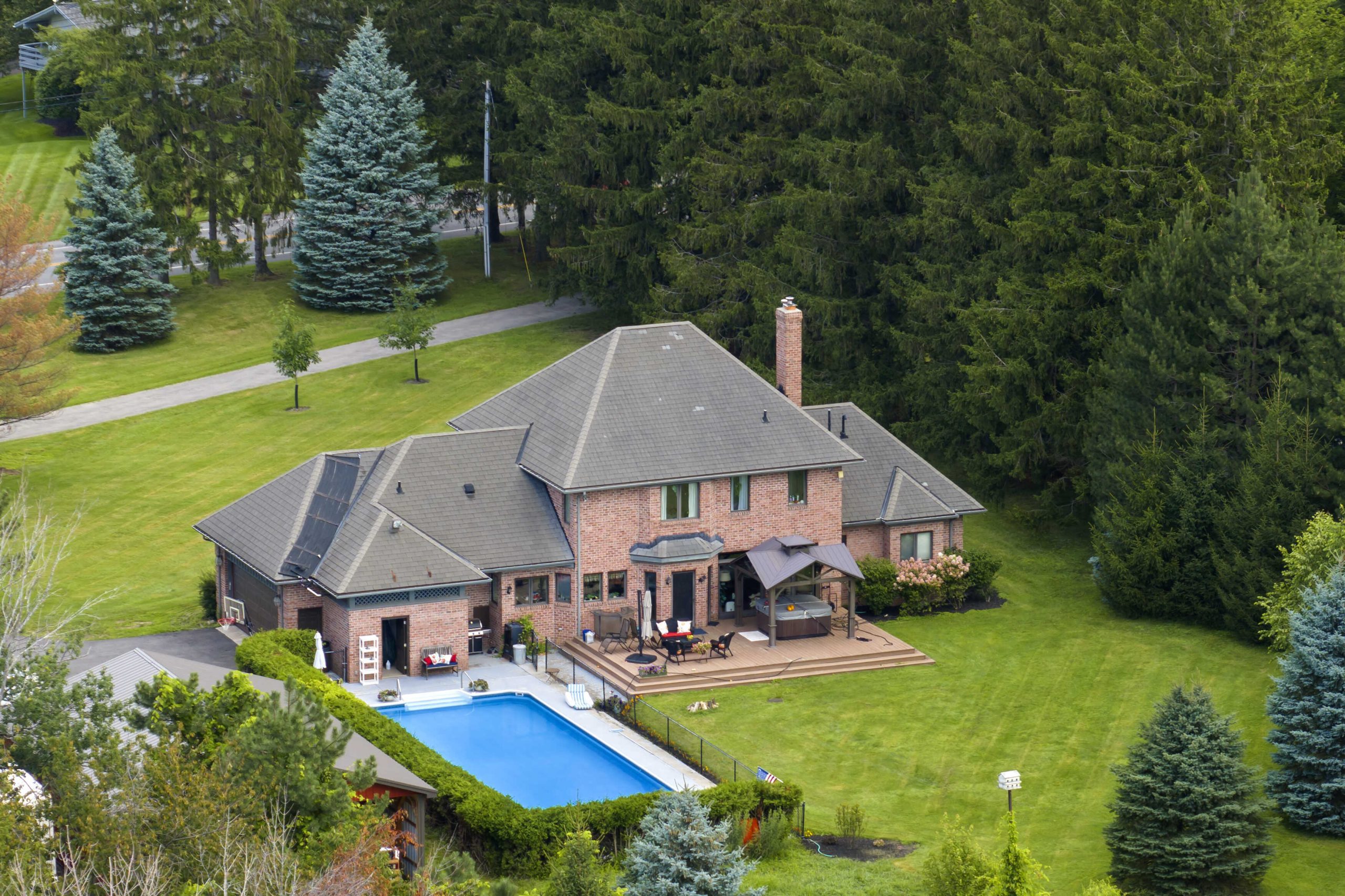 upscale-suburban-home-with-large-swimming-pool-in-2024-12-06-11-47-25-utc (1)